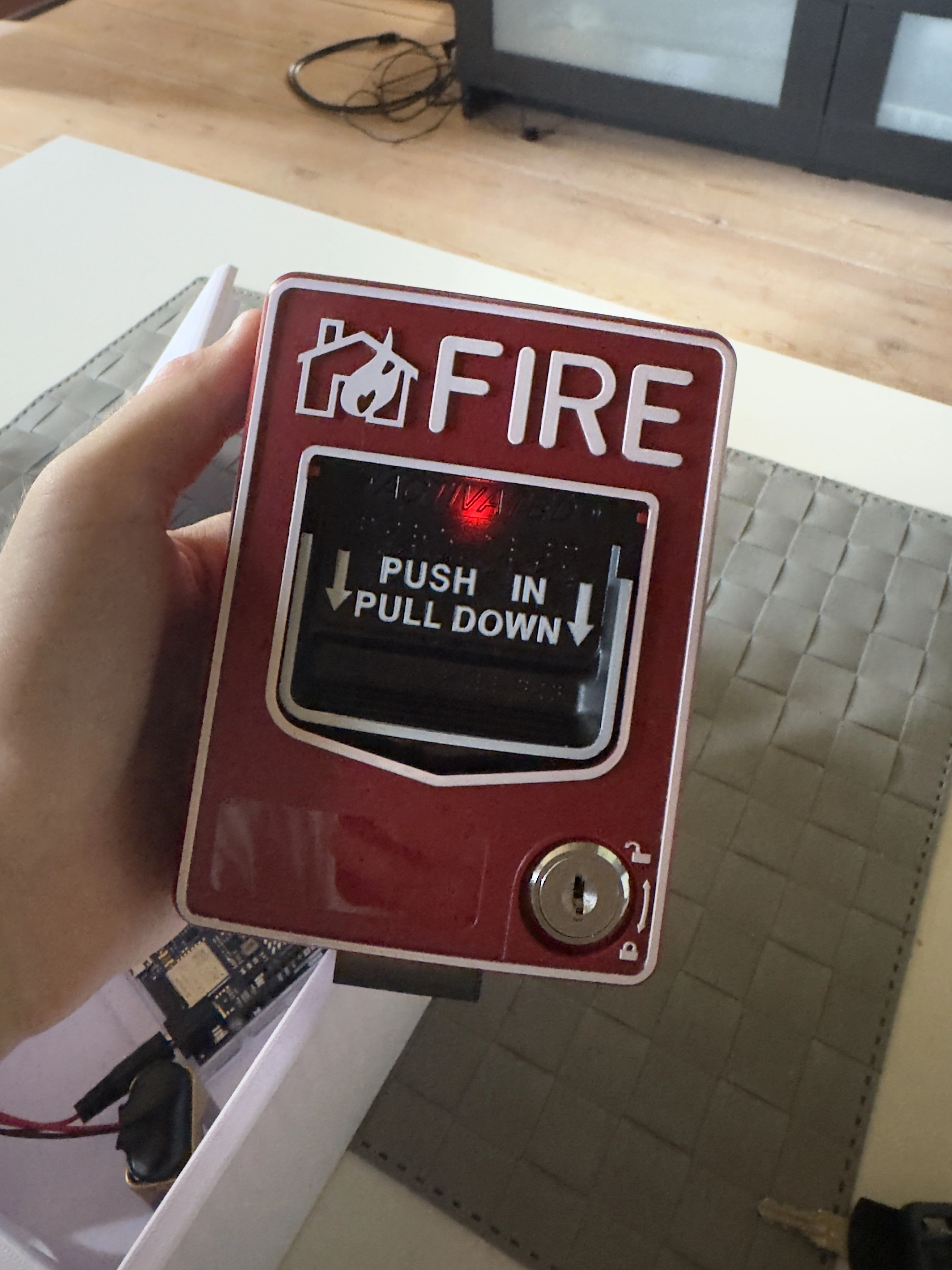 Arduino-based IoT alarm system hardware setup with wireless components and call point trigger